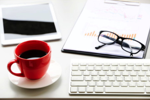 red mug and computer red mug and computer